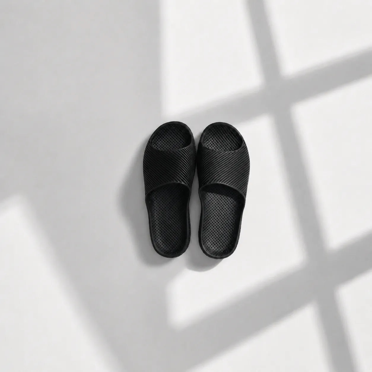 EASE 02 3D printed slide sandal — wave-textured upper and open honeycomb lattice sole