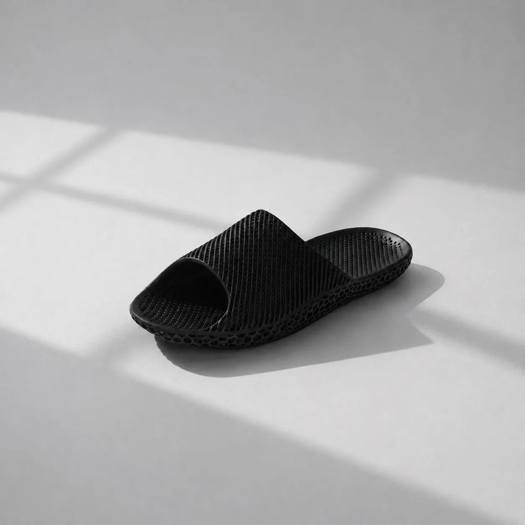 EASE 02 3D printed slide sandal — wave-textured upper and open honeycomb lattice sole