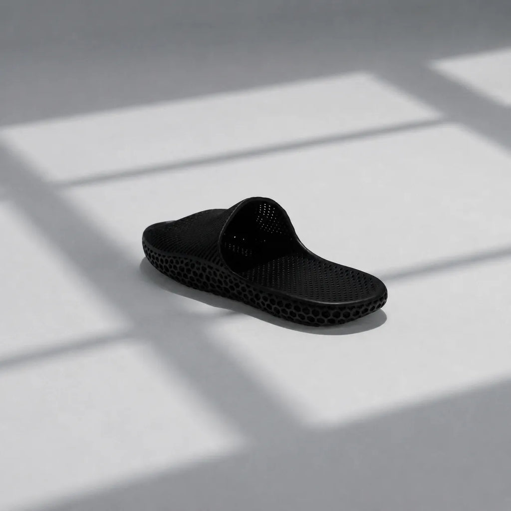 EASE 02 3D printed slide sandal — wave-textured upper and open honeycomb lattice sole