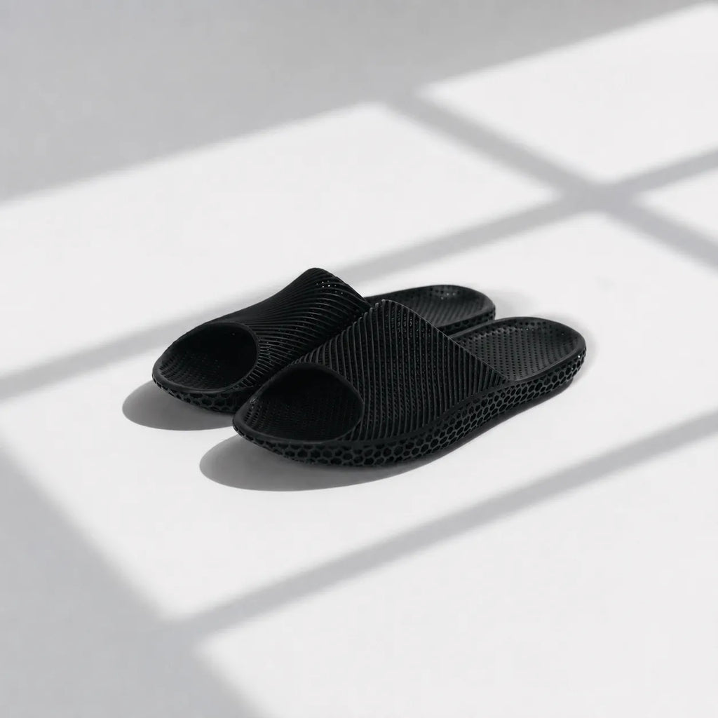 EASE 02 3D printed slide sandal — wave-textured upper and open honeycomb lattice sole