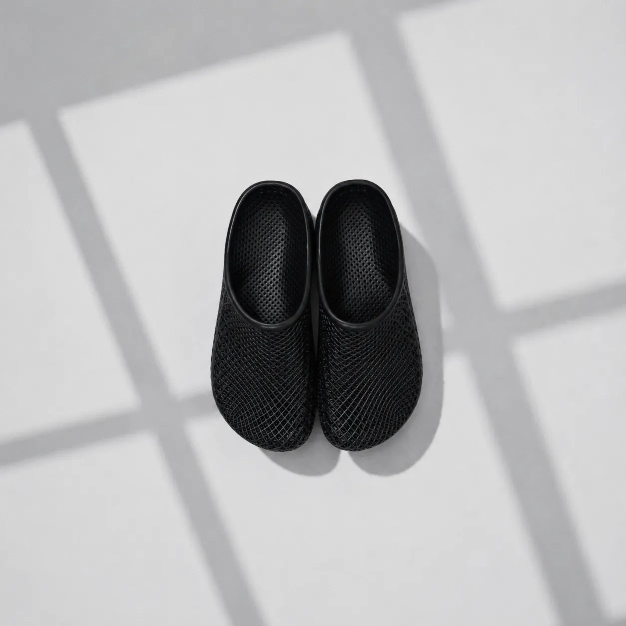 TRANSIT 01 3D printed mule — open lattice upper and platform sole