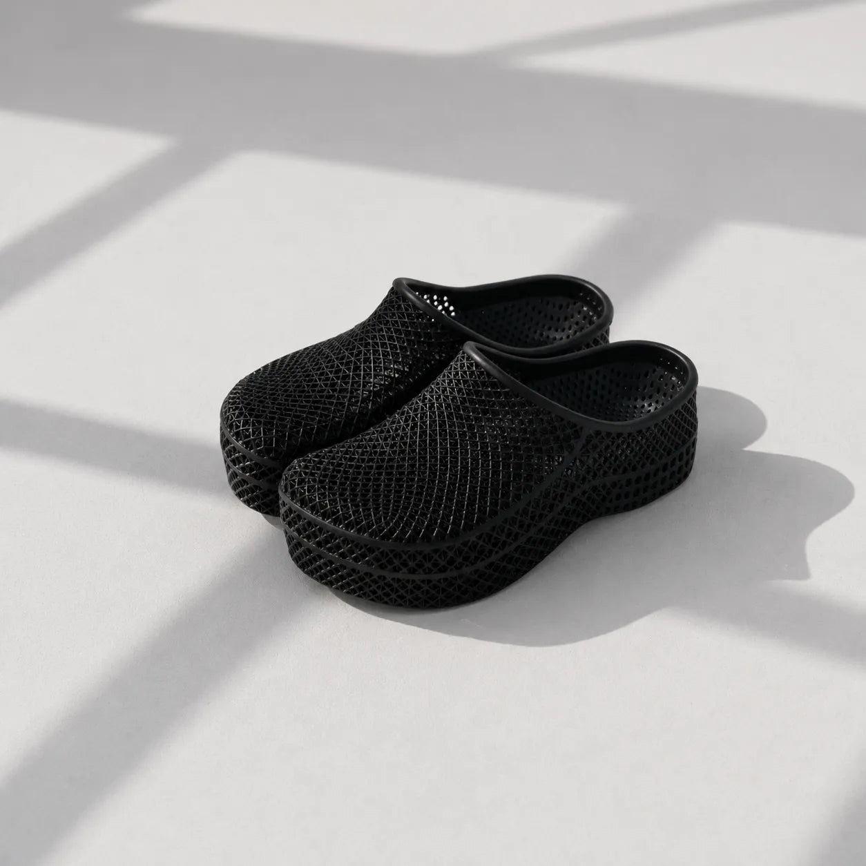 TRANSIT 01 3D printed mule — open lattice upper and platform sole