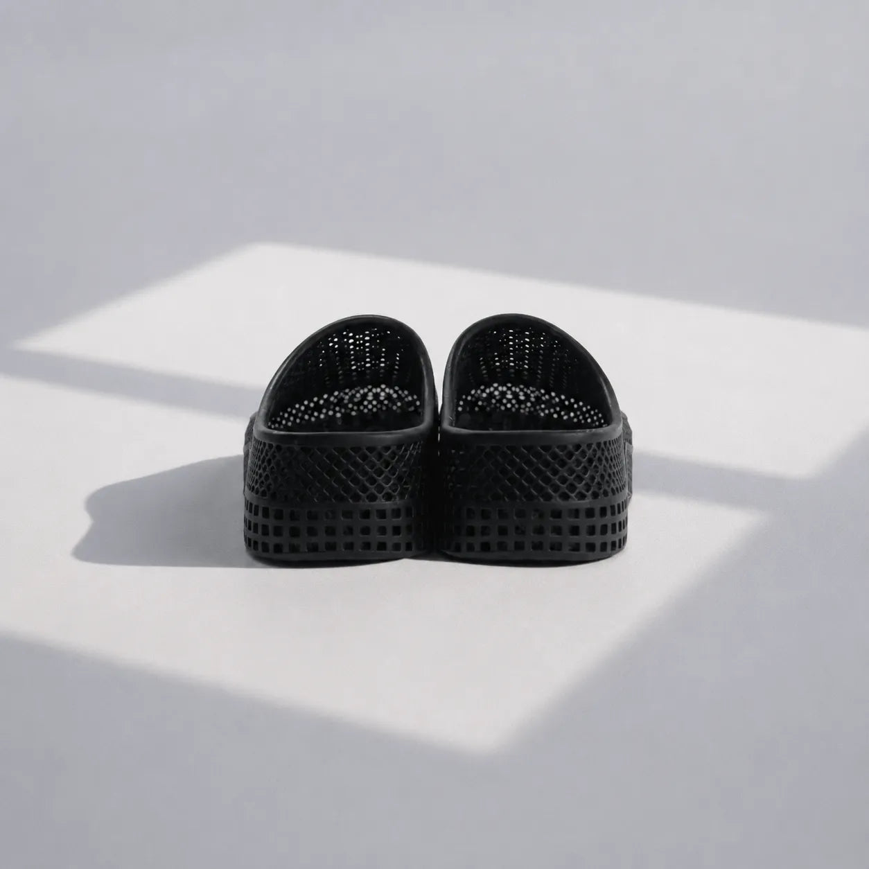 TRANSIT 01 3D printed mule — open lattice upper and platform sole