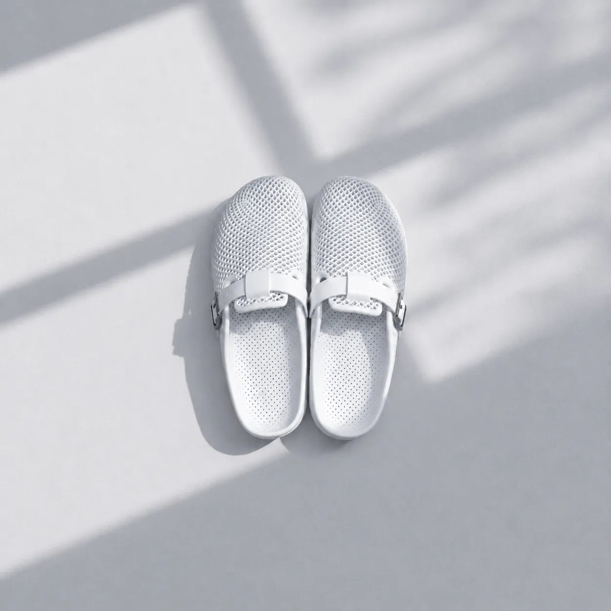 TRANSIT 02 3D printed clog — lattice upper, buckle strap, and contoured sole