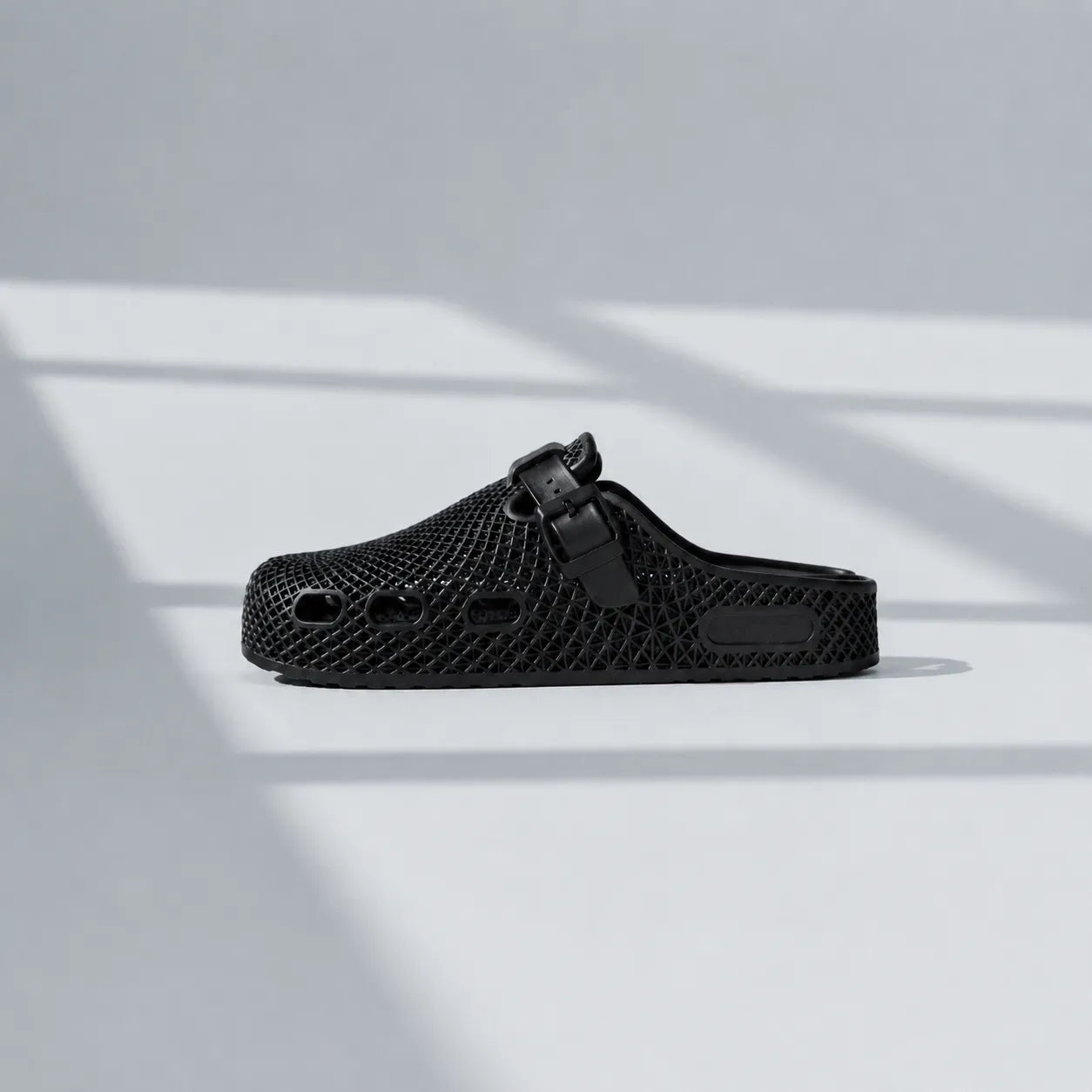TRANSIT 02 3D printed clog — lattice upper, buckle strap, and contoured sole