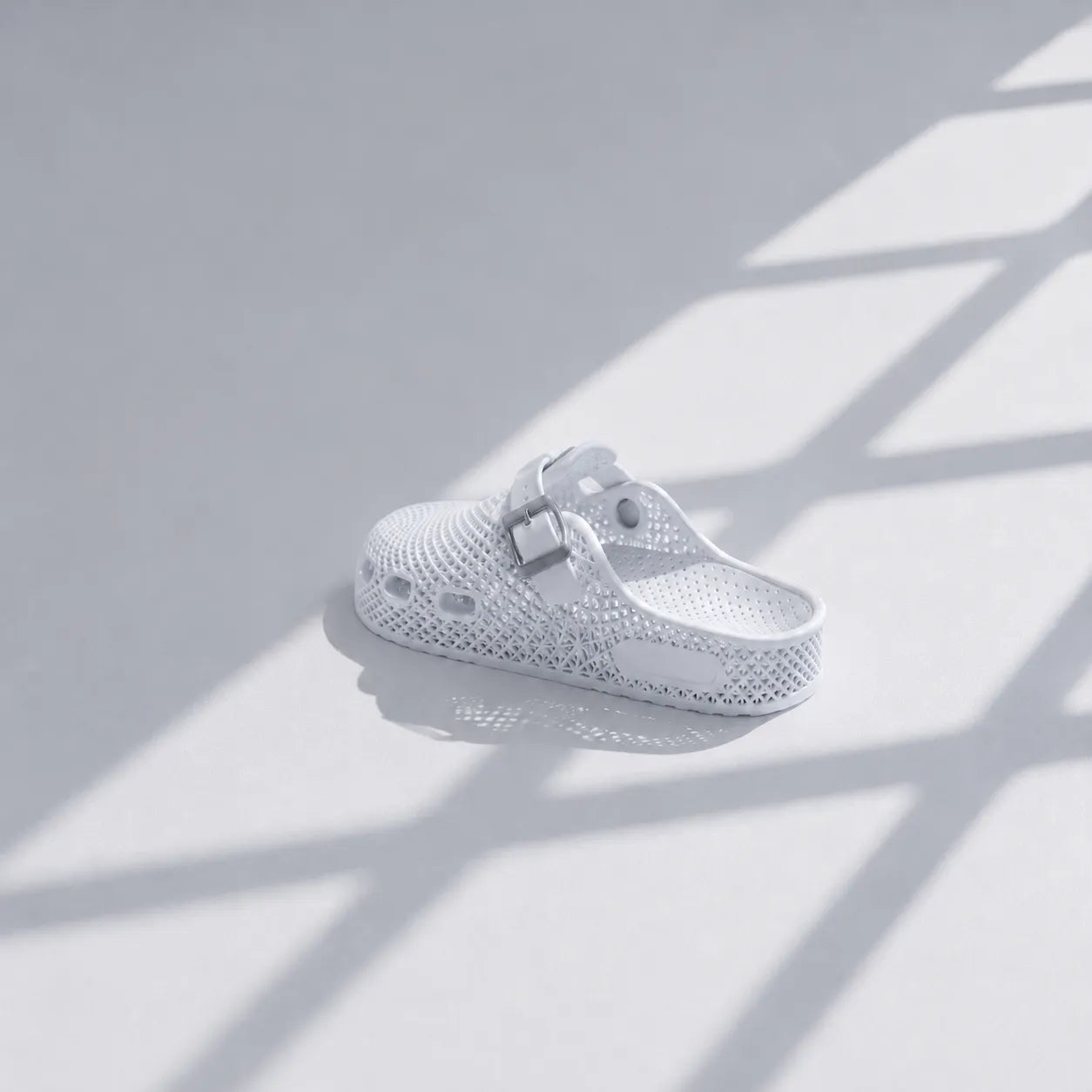 TRANSIT 02 3D printed clog — lattice upper, buckle strap, and contoured sole