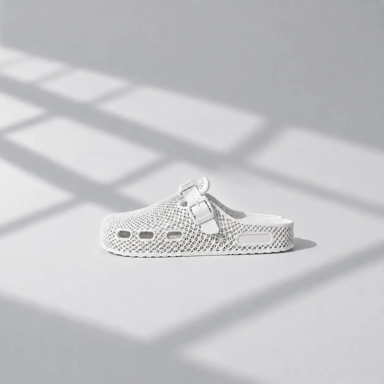 TRANSIT 02 3D printed clog — lattice upper, buckle strap, and contoured sole